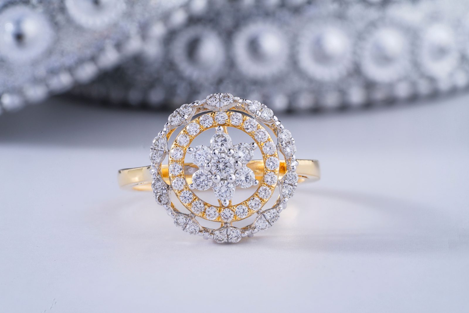 Custom two-tone gold and diamond cluster ring handcrafted at Lucky’s in Bakersfield